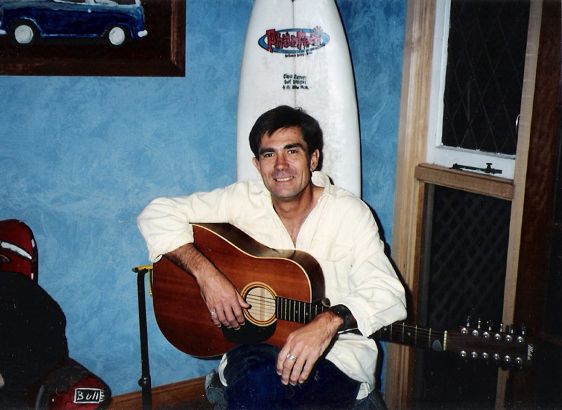 Jim with guitar at a Phantom do